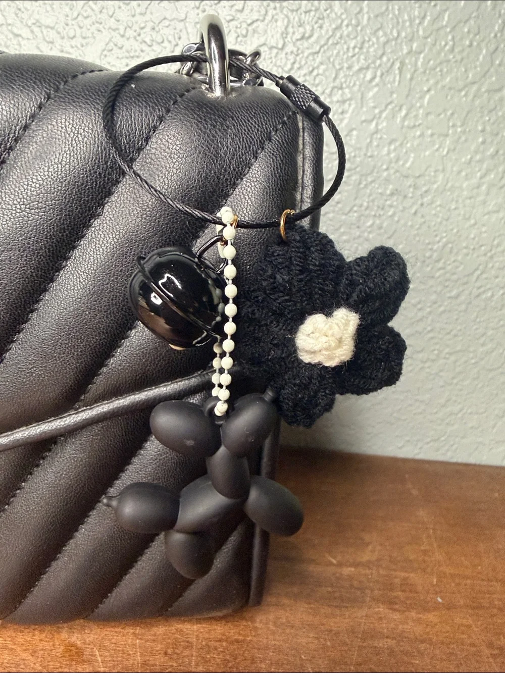 Black and White Ballon Dog Bag Charm with bell and flower